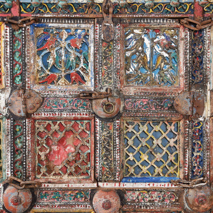 A dramatic painted Indian Damchiya dowry chest  with beautifully painted Indian mirrors and lota.