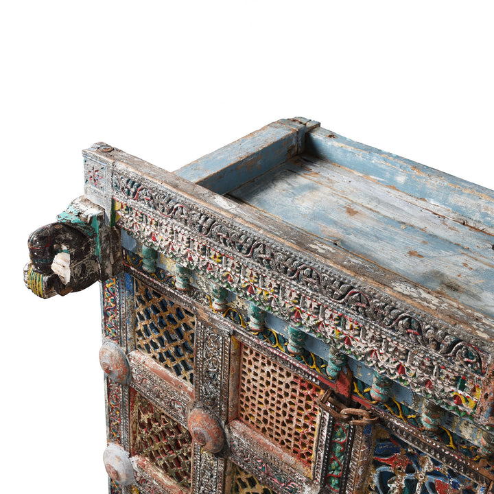 A dramatic painted Indian Damchiya dowry chest  with beautifully painted Indian mirrors and lota.