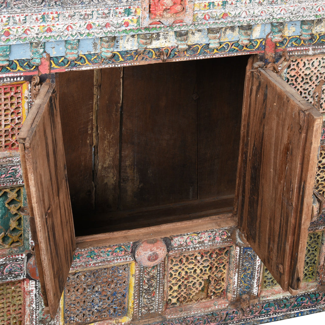 A dramatic painted Indian Damchiya dowry chest  with beautifully painted Indian mirrors and lota.