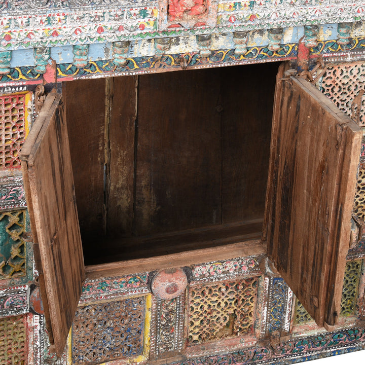 A dramatic painted Indian Damchiya dowry chest  with beautifully painted Indian mirrors and lota.