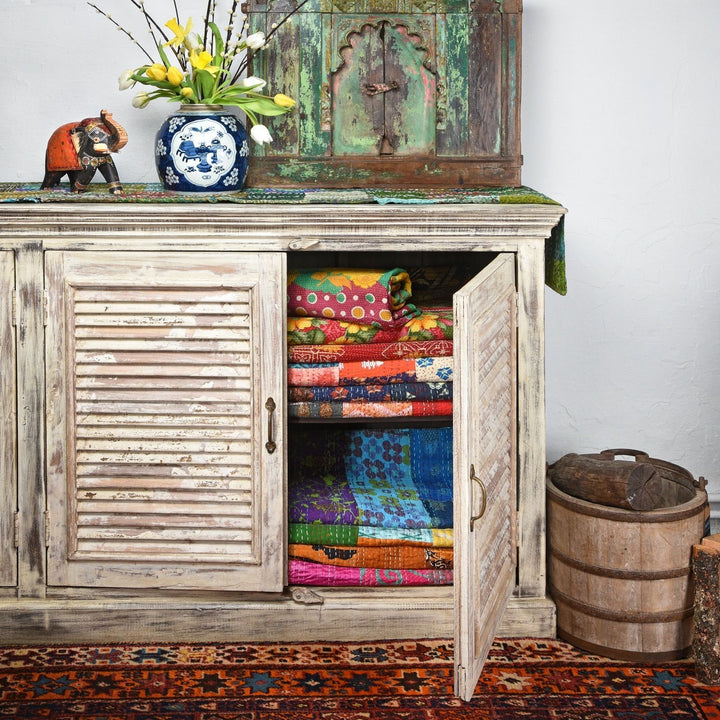 Lifestyle Detail Of Reclaimed Teak 3 Door Louvre Cabinet With Paint Finish | Indigo Antiques