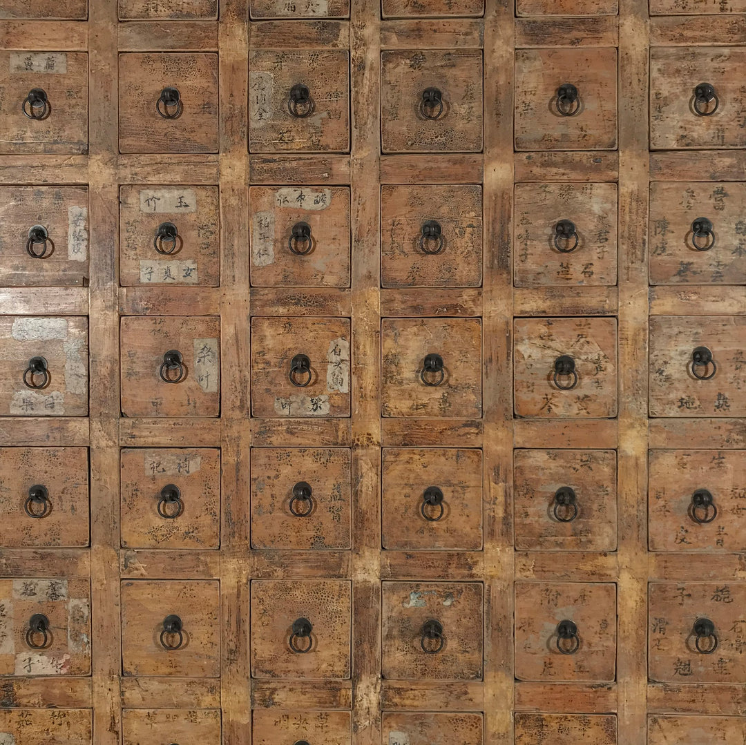 Open Drawers of a Chinese apothacary chest of drawers, also known as a chinese medicine cabinet. This cabinet is yellow