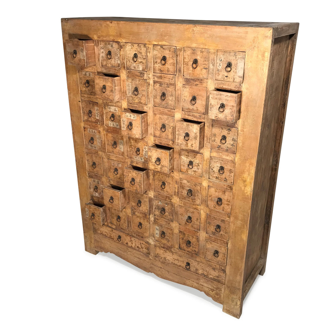 Open Drawers of a Chinese apothacary chest of drawers, also known as a chinese medicine cabinet. This cabinet is yellow