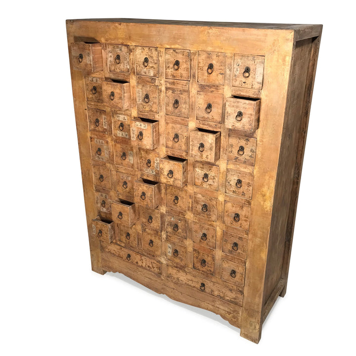 Open Drawers of a Chinese apothacary chest of drawers, also known as a chinese medicine cabinet. This cabinet is yellow