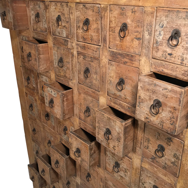 Open Drawers of a Chinese apothacary chest of drawers, also known as a chinese medicine cabinet. This cabinet is yellow