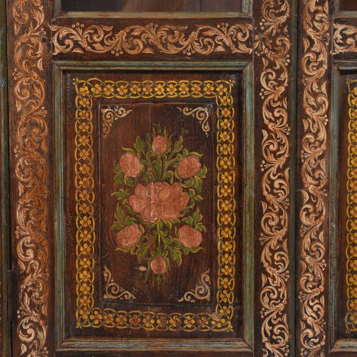 Painting detail from a green and cream painted antique Indian cabinet from Maharashtra dating from the 19th century | Indigo Antiques 